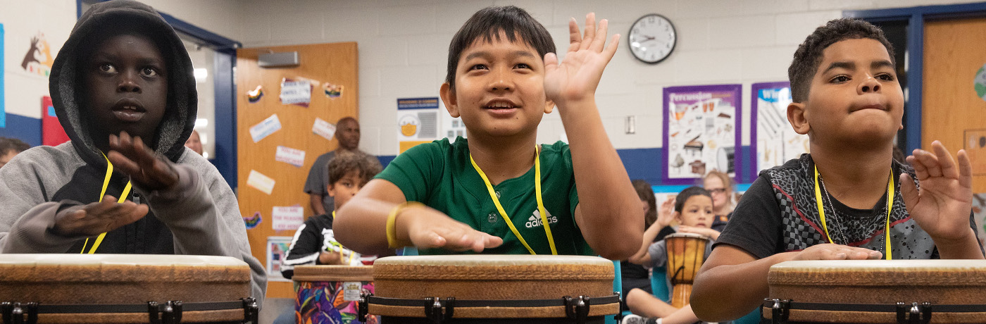 students playing drums